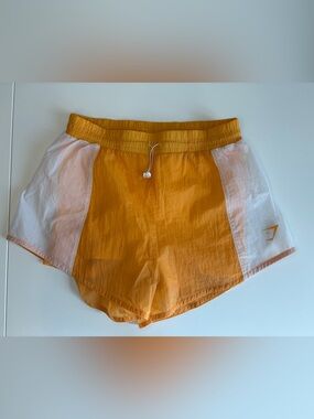 Gymshark Women’s Orange and White Athletic Shorts